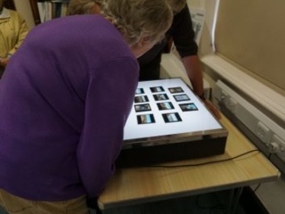 A member of the Langtree History Group researches WWI records held by the museum 29.6.17 (© North Devon Museums Service)