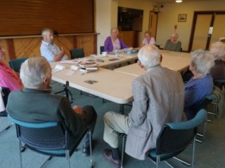 Members of Langtree History Group discuss their research in the Parish Hall 24.5.17 (© North Devon Museums Service)