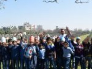 14. A visit by a UNRWA school to the CWGC in Gaza (Photo courtesy of CWGC)