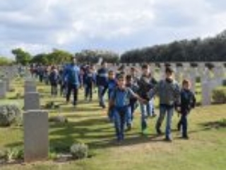 24. A visit by a UNRWA school to the CWGC in Gaza (Photo courtesy of CWGC)