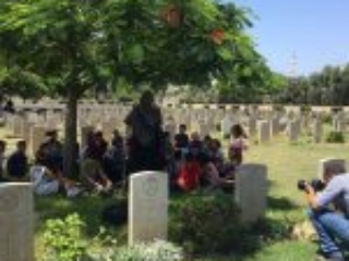 31. Children from an educational institution operating in the Gaza Strip visit the Gaza War Cemetery (Photo courtesy of CWGC)