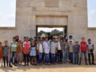 34. Children from an educational institution operating in the Gaza Strip visit the Gaza War Cemetery (Photo courtesy of CWGC)
